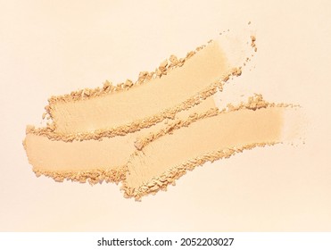 Bronzer or blusher and compact powder beige nude smudge  background