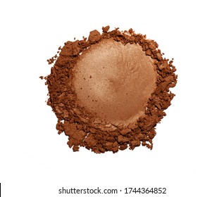 Bronzer or eyeshadow swatch. Crashed brown shimmer face powder texture. Nude eye shadow smudge isolated on white background