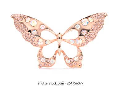 Brooch in the form of a golden butterfly on a white background