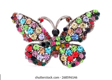 brooch in the shape of a butterfly on a white background
