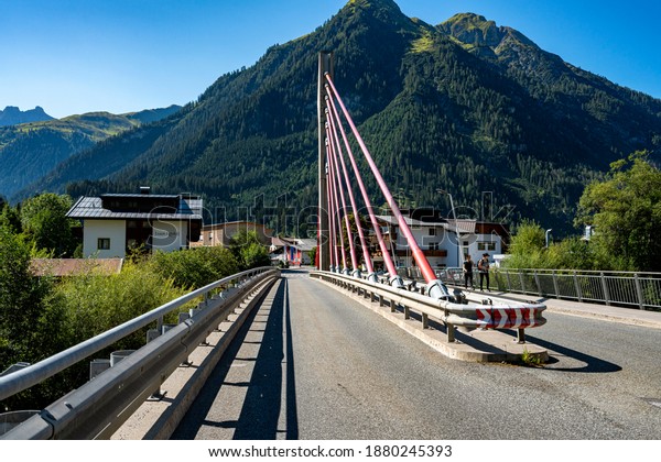 brook, tyrol, austria, 2020, september,\
05, a modern bridge over the lech river in\
tyrol