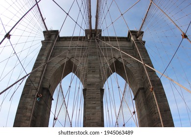 Brooklyn Bridge Arch Against Blue Sky, New York