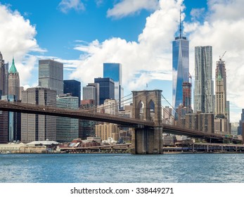 The Brooklyn Bridge and the Lower Manhattan skyline in New York City - Shutterstock ID 338449271