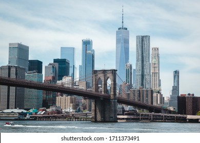 Brooklyn bridge and Manhattan cityscape, view on New York downtown from Dumbo, Brooklyn, USA