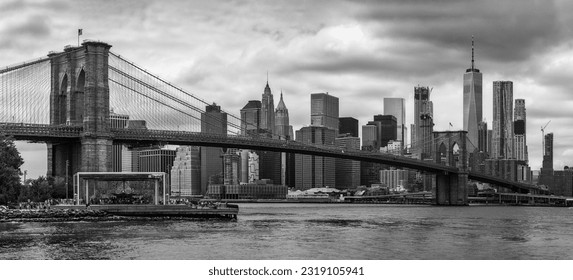 Brooklyn Bridge with Manhattan skyline in the background  in black and white, USA - Powered by Shutterstock