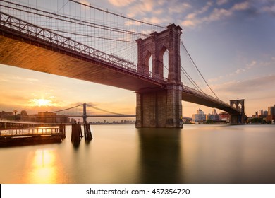 Brooklyn Bridge in New York City at sunrise.