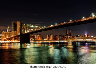 Brooklyn Bridge Of New York In The Night. City Concept.