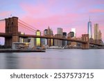 Brooklyn Bridge, Skyline Manhattan, East River at sunrise, New York City, New York, USA