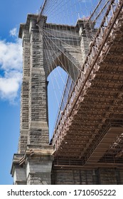 The Brooklyn Bridge spans between lower Manhattan and Brooklyn in New York City