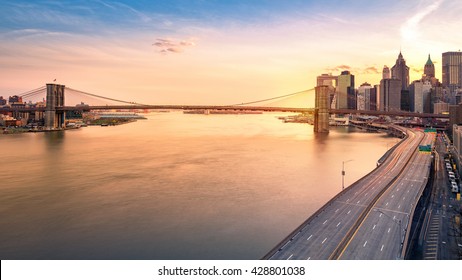 Brooklyn Bridge And With Traffic Trails On The FDR Drive At Dusk