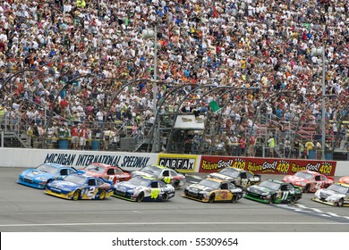 BROOKLYN, MI - JUNE 13:   The NASCAR Spint Cup Cars Take The Green Flag For The Heluva Good! Sour Cream Dips 400 Race At The Michigan International Speedway In Brooklyn, MI On June 13, 2010