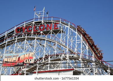 BROOKLYN, NEW YORK - AUGUST 19, 2017: Historical landmark Cyclone roller coaster in the Coney Island section of Brooklyn. Cyclone is a historic wooden roller coaster opened on June 26, 1927