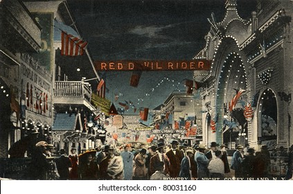 BROOKLYN, NEW YORK - CIRCA 1912: Vintage postcard depicting the Bowery by Night on Coney Island, Brooklyn, New York, USA, circa 1912.