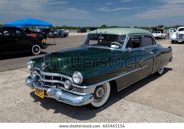 BROOKLYN, NEW YORK -\
JUNE 11 2017: A 1951 Cadillac on display at the Antique Automobile\
Association of Brooklyn Annual Show at the Floyd Bennett Field in\
Brooklyn, New York,\
USA.