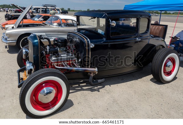 BROOKLYN, NEW YORK -\
JUNE 11 2017: A 1930 Ford on display at the Antique Automobile\
Association of Brooklyn Annual Show at the Floyd Bennett Field in\
Brooklyn, New York,\
USA.