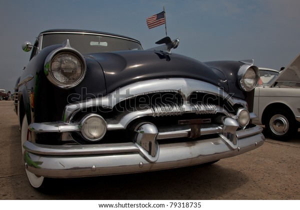 BROOKLYN, NEW YORK - JUNE 12: A 1954 Packard Pacific\
at the Antique Automobile Association of Brooklyn Spring Dust Off\
Car Show on June 12, 2011 at Floyd Bennett Field in Brooklyn, New\
York, USA.