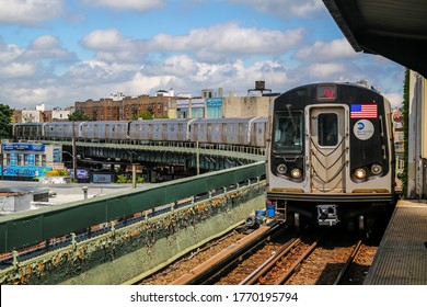 BROOKLYN, NEW YORK - JUNE 28, 2015: NYC Subway Q Train arrives at Brighton Beach Station in Brooklyn. Owned by the NYC Transit Authority, the subway system has 469 stations in operation