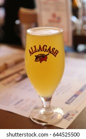 BROOKLYN, NEW YORK - MAY 21, 2017: Allagash White Belgian-style Wheat Beer Served In Brooklyn's Restaurant. Allagash Brewing Company Is A Brewery In Portland, Maine