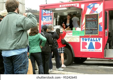 BROOKLYN, NEW YORK, MAY 22: Customers Line Up To Purchase Food From A Food Truck In Grand Army Plaza On May 22, 2011. Food Trucks Are A Popular New Source For Fast, Inexpensive, Yet Creative Food.