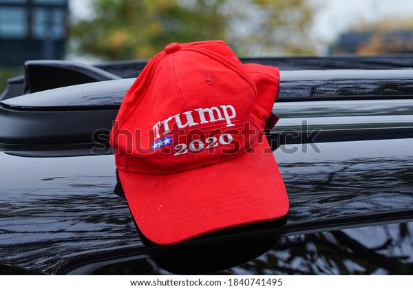 BROOKLYN, NEW YORK - OCTOBER 25, 2020:\
Trump 2020 hat. President Trump supporters participate at New York\
for Trump 2020 car parade in Brooklyn, New\
York