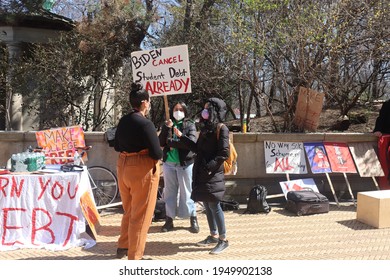 Brooklyn, New York  United States - April 3, 2021: Protester At Rally Holding Sign With Words Biden Cancel Student Debt Already