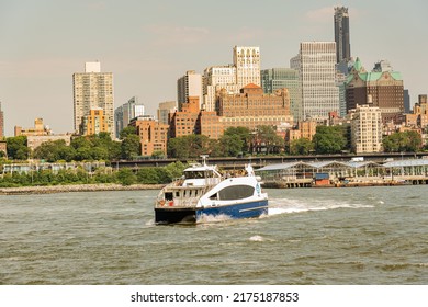 Brooklyn, New York, USA - July 1, 2022: Landscape With The View On Brooklyn Bridge, East River, New York City  Buildings And Water Way Ferry