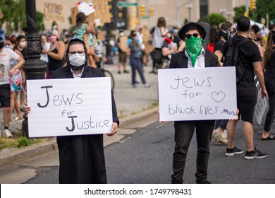 Brooklyn, New York / USA - June 4, 2020: Jews Jewish People From Hasidic Community Supporting And Protesting For Black Lives Matter George Floyd Movement During Coronavirus Covid-19 Pandemic With Mask