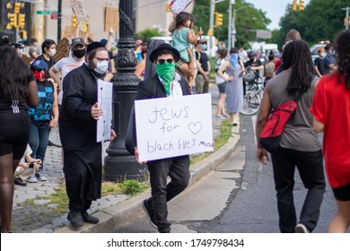 Brooklyn, New York / USA - June 4, 2020: Jews Jewish People From Hasidic Community Supporting And Protesting For Black Lives Matter George Floyd Movement During Coronavirus Covid-19 Pandemic With Mask