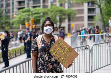 Brooklyn, New York / USA - June 4, 2020: Protesters And People With Signs And Posters And Messages Protesting In Black Lives Matter George Floyd Rally During Coronavirus Covid-19 Pandemic