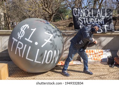 BROOKLYN, N.Y. – April 3, 2021: A demonstrator protests near Grand Army Plaza during a rally to cancel student loan debts.