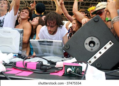 BROOKLYN, NY - AUGUST 23: DJ Girl Talk Performing During The Jelly Pool Party Held At East River Park On August 23, 2009 In Brooklyn, NY.