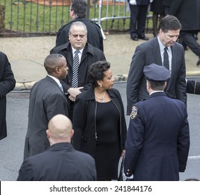 Brooklyn, NY - January 04, 2015: FBI Director James Comey & Loretta Lynch Nominee For Attorney General Attend Ceremony At Aievoli Funeral Home For The Funeral Of Slain NYC Police Officer Wenjian Liu