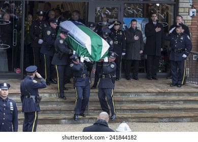 Brooklyn, NY - January 04, 2015: Police Officers Carry Casket Outside Aievoli Funeral Home For The Funeral Of Slain New York City Police Officer Wenjian Liu