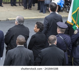 Brooklyn, NY - January 04, 2015: FBI Director James Comey & Loretta Lynch Nominee For Attorney General Attend Ceremony At Aievoli Funeral Home For The Funeral Of Slain NYC Police Officer Wenjian Liu