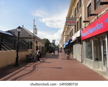 Brooklyn, NY - July 12 2012: View Of A Sidewalk And Storefronts At Newkirk Plaza In The Flatbush Neighborhood Of Brooklyn