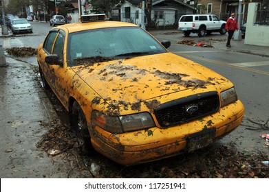BROOKLYN, NY - OCTOBER 30: Yellow Cabs All In Mud In The Sheapsheadbay Neighborhood Due To Flooding From Hurricane Sandy In Brooklyn, New York, U.S., On Tuesday, October 30, 2012.