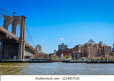 Brooklyn, NY / USA - April 25, 2013: Entrance To Brooklyn, New York With The Brooklyn Bridge, Lighthouse, And Jehovah Witness Watchtower Building.