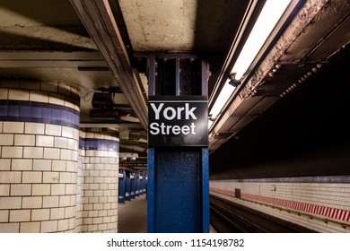 Brooklyn, NY / USA - JUL 31 2018: York Street Subway sign and platform