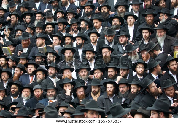 BROOKLYN, NY--NOVEMBER 19, 2017: Hasidic rabbis from around the world gather for their annual "class picture" at Chabad Lubavitch headquarters in Brooklyn, New York.