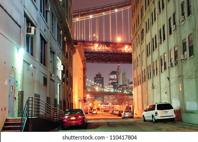 Brooklyn Street View At Night With New York City Manhattan Downtown Skyline, Brooklyn Bridge And Manhattan Bridge.