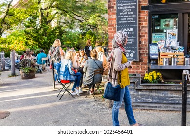 Brooklyn, USA - October 28, 2017: Outside Outdoors In NYC New York City Brooklyn Bridge Park With Many Crowd Of People Eating Food On Tables At Luke's Seafood Lobster Restaurant