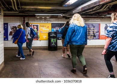 Brooklyn, USA - October 28, 2017: People Walking In Underground Transit By Fulton Street Exit Sign In NYC New York City Subway Station, By Brooklyn Bridge