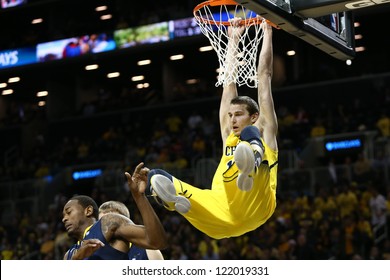 BROOKLYN-DEC 15: Michigan Wolverines Guard Nik Stauskas (11) Dunks Against The West Virginia Mountaineers During The First Half At Barclays Center On December 15, 2012 In Brooklyn.