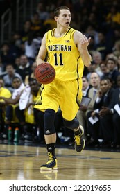 BROOKLYN-DEC 15: Michigan Wolverines Guard Nik Stauskas (11) Dribbles The Ball Against The West Virginia Mountaineers During The First Half At Barclays Center On December 15, 2012 In Brooklyn.