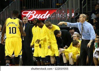 BROOKLYN-DEC 15: Michigan Wolverines Head Coach John Beilein (R) Reacts With Players Against The West Virginia Mountaineers At Barclays Center On December 15, 2012 In Brooklyn.