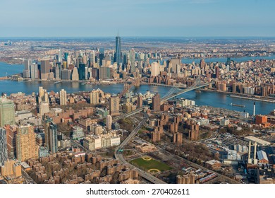 BROOKLYN,NY - APRIL 5:Aerial View Of Brooklyn With Downtown Manhattan In The Background On April 5,2015.It Is The Most Populous Of New York City's Five Boroughs, With About 2.6 Million People