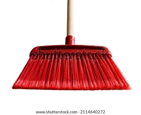 broom with red tail isolated on white background