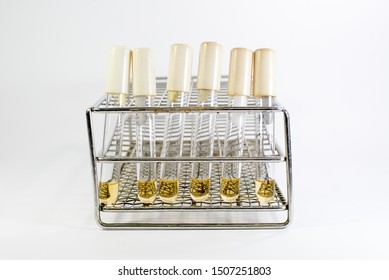 the broth culture or water media for culture media in bacteria or microbiology laboratory in white background. The broth culture on that glass tube with write cap and black screw cap - Shutterstock ID 1507251803