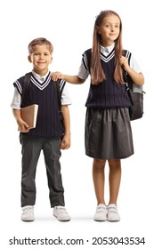 Brother And Older Sister In School Uniforms Isolated On White Background