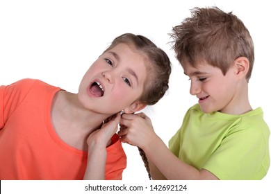 Brother Pulling Sister's Hair